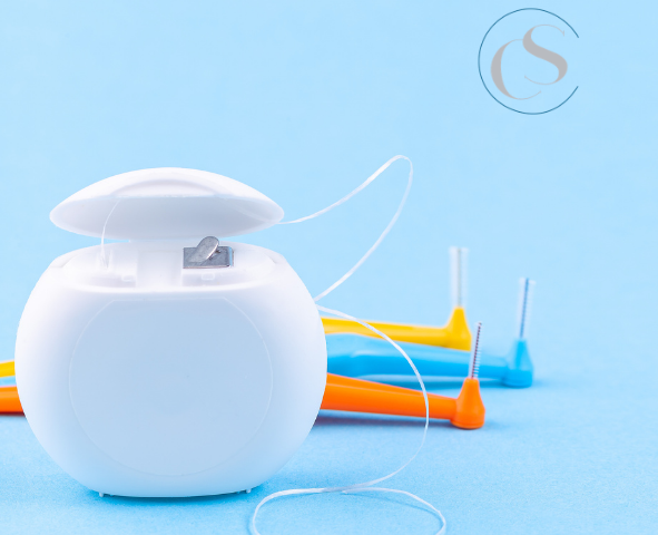 uso del hilo dental y cepillo interdental